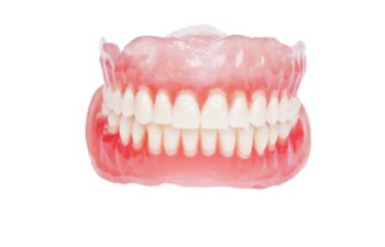 Set of upper and lower full dentures with gum-colored base and white artificial teeth, isolated on a white background.